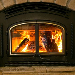 Can you burn wood in a gas fireplace?