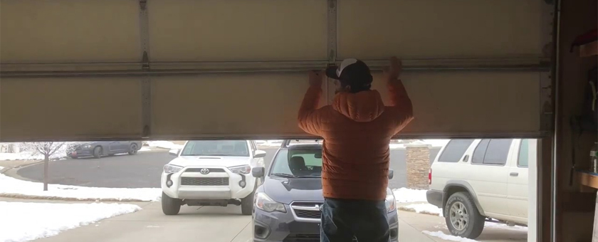 How to open a garage door with a broken spring