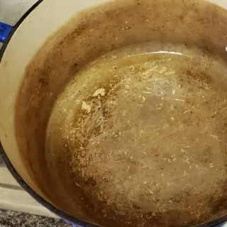 how to clean discolored enamel cookware
